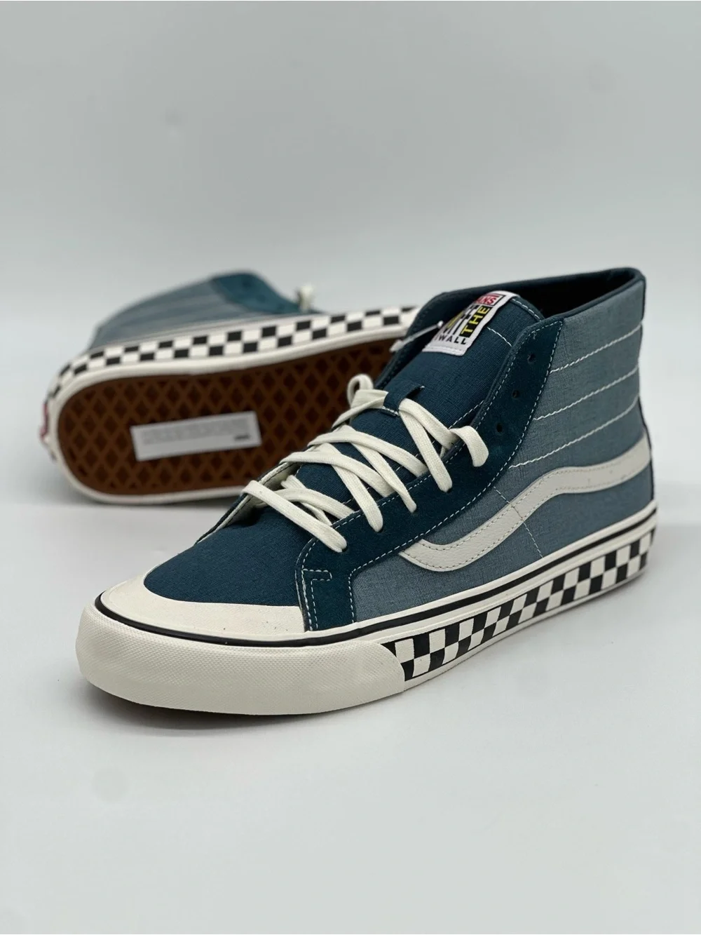Vans Mid-Top Sneakers in Teal and White with Checkerboard Sole